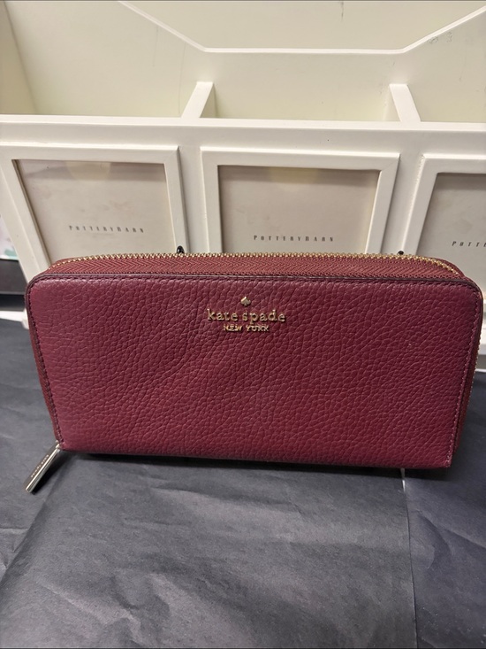kate spade Handbags - kate spade Burgundy Pebbled Leather Zip Wallet with Gold Logo